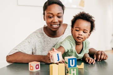 mom and kid playing